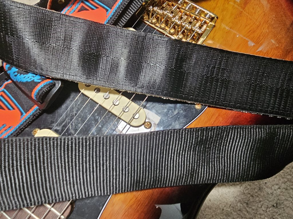 Back of Temu guitar strap and Fender